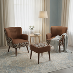 A styled living room scene featuring two brown upholstered armchairs with zebra-print side panels, a matching brown ottoman, a small round side table, a floor lamp, and a light blue patterned rug.